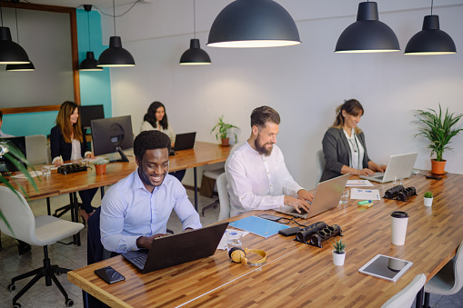 TrustLine Express team collaborating in a modern office